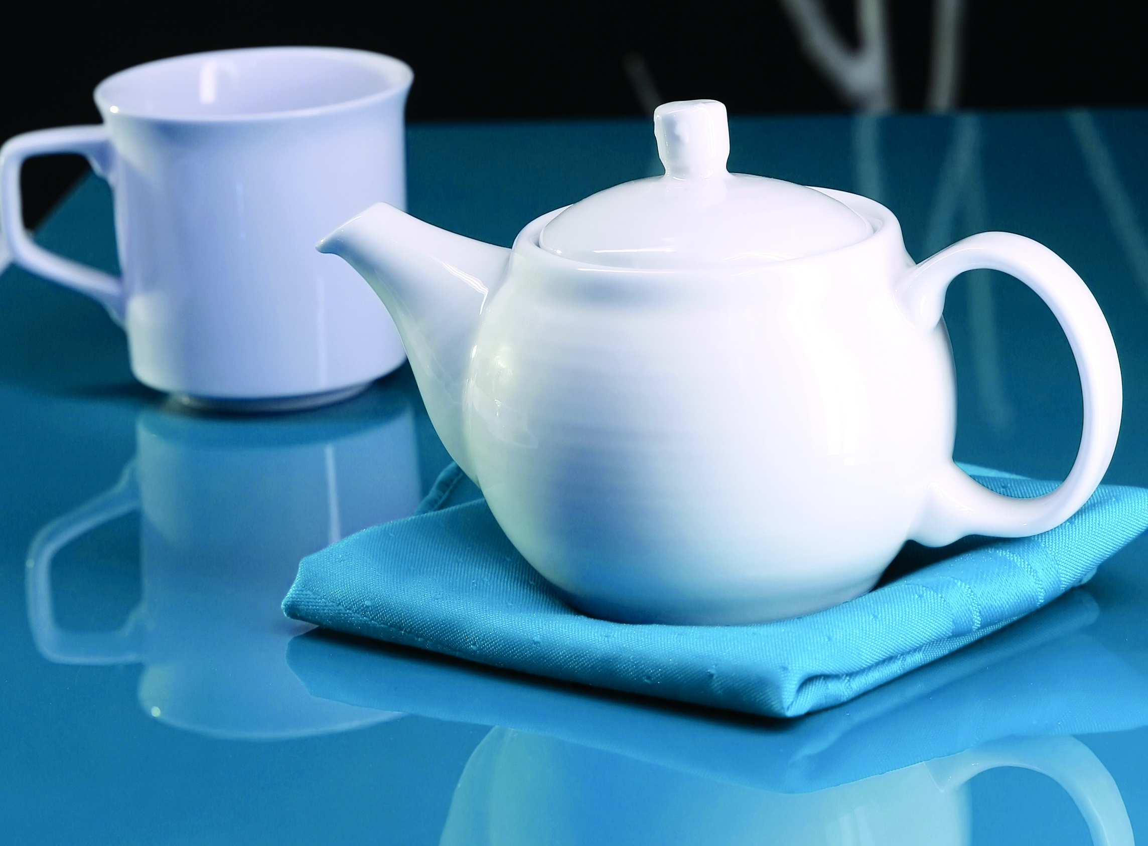 Tea pot and cup